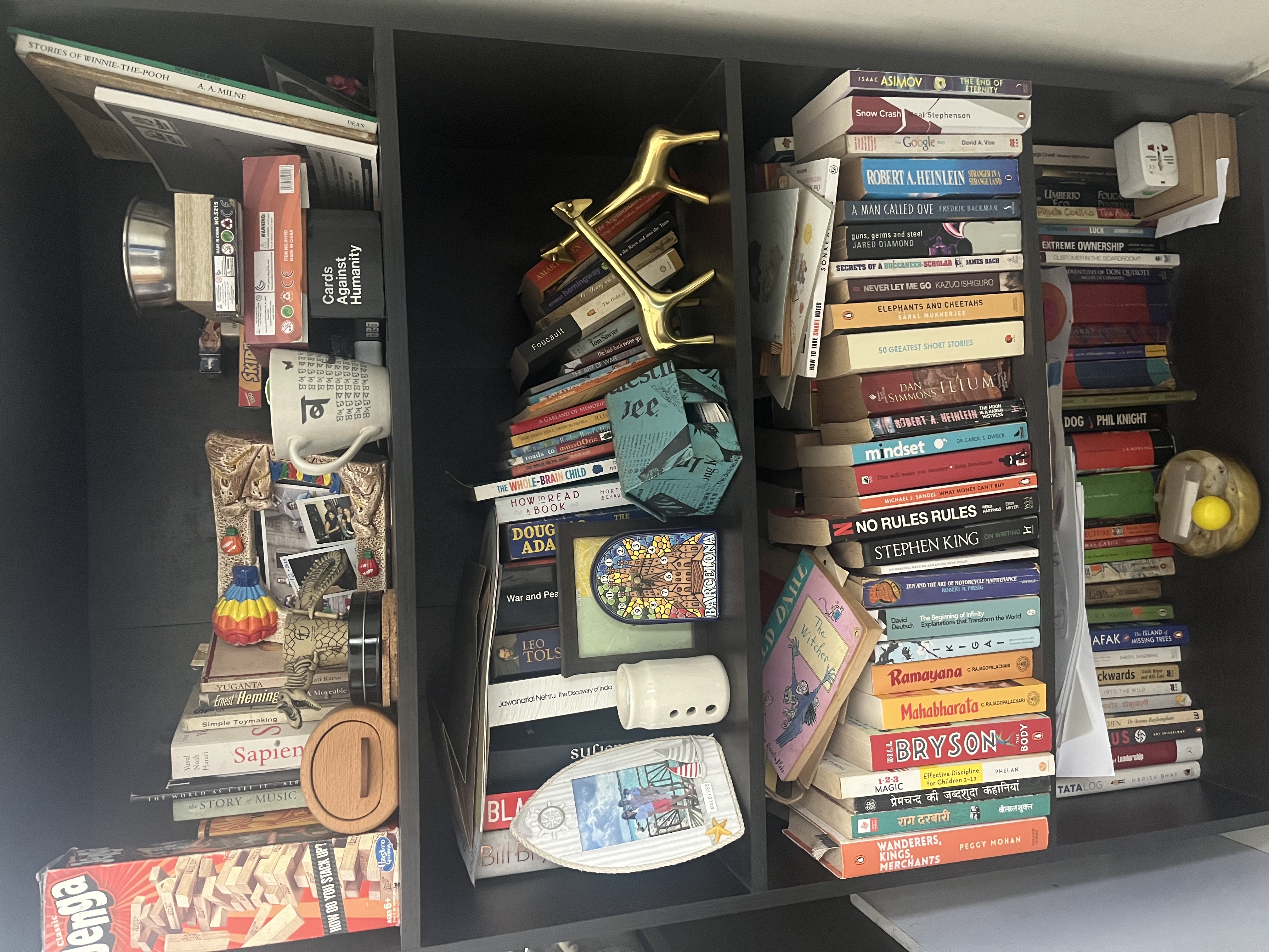 Messy but mine. Can you spot the Tom Sawyer book? It's just behind the left giraffe